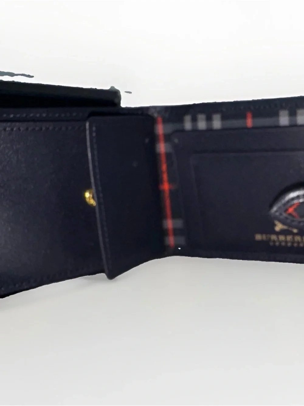 Burberry’s Black Leather Men's Wallet with Plaid Interior